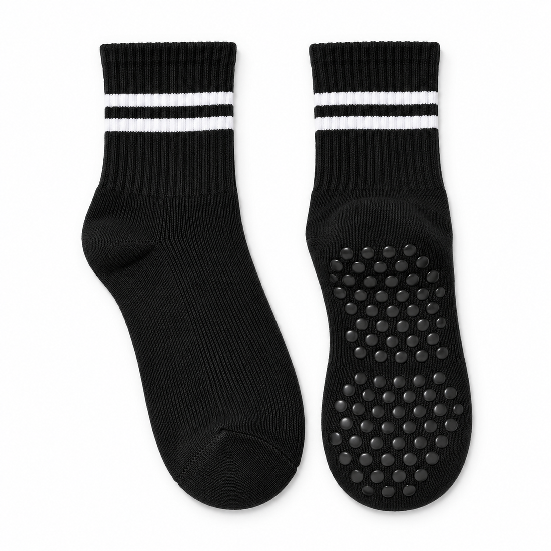 Black striped Pilates grip socks, matching pair, front view