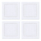 Set of four white hemstitch cocktail napkins laid out in a two-by-two grid